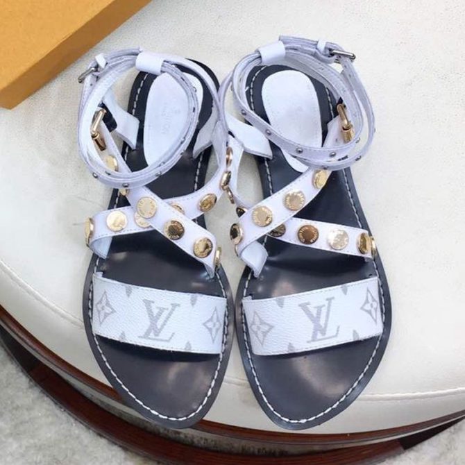 Louis Vuitton Flat Passenger Studs Cross Sandals 1A4VOW White